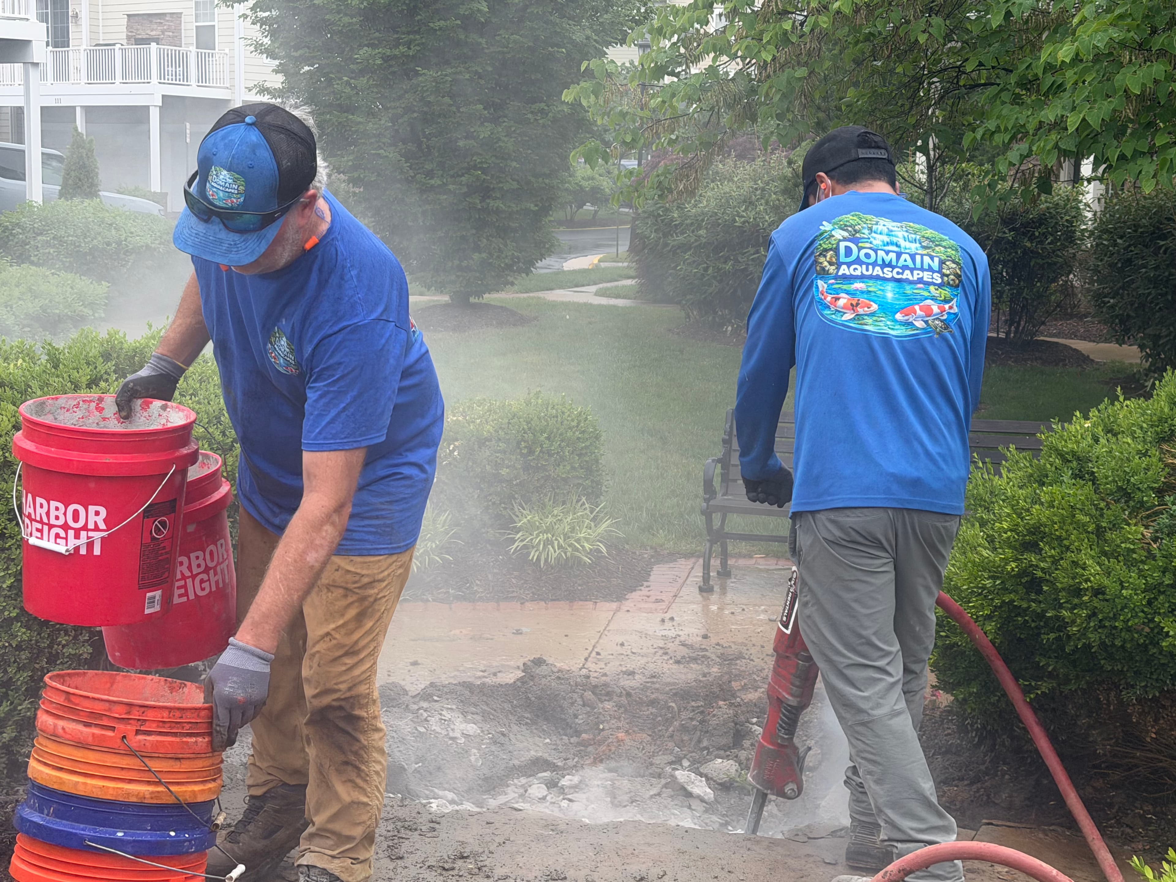 Project Tearing Out Old Concrete to Make Way for a Slate Urn Fountain image