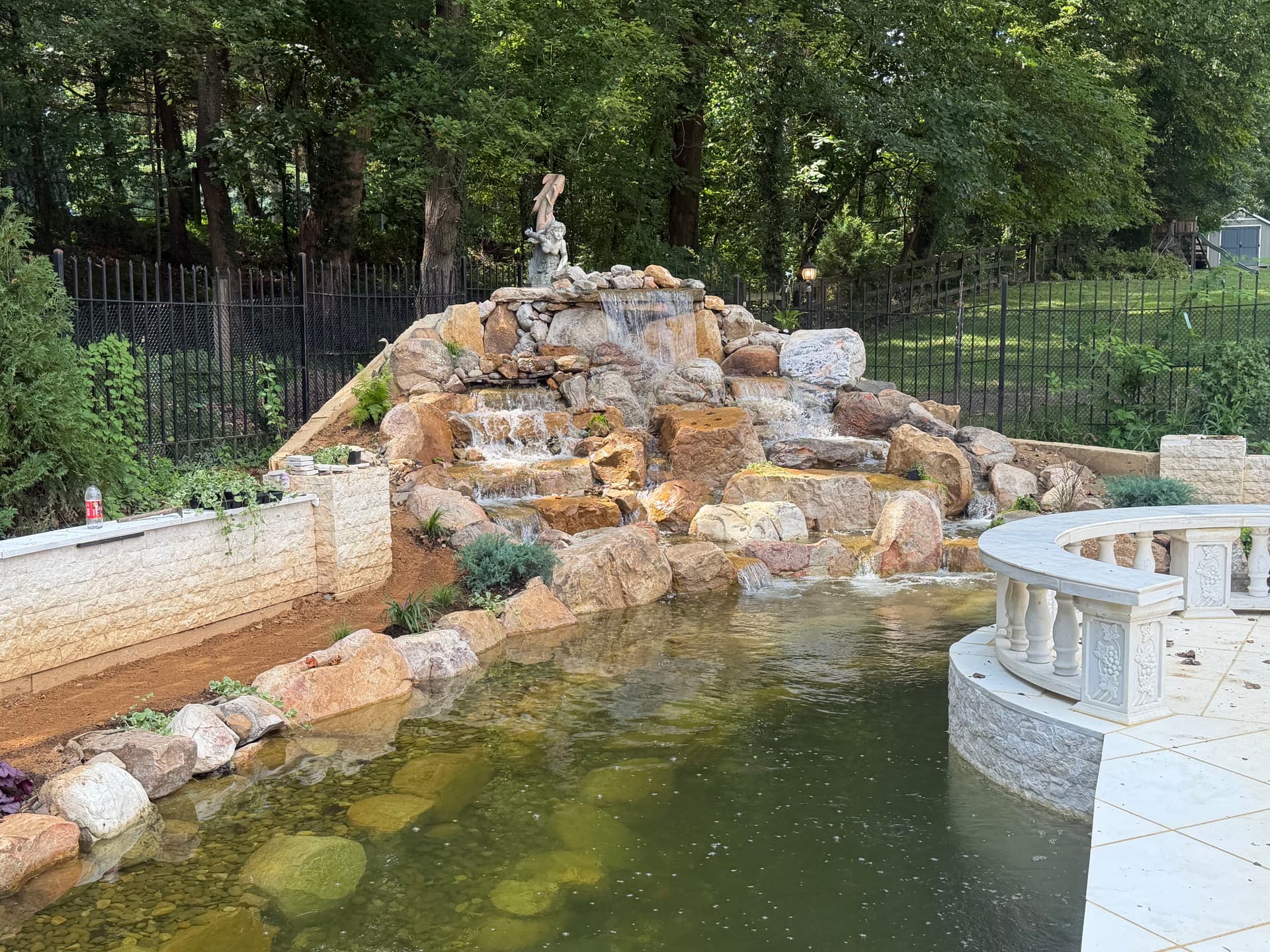 Gallery photos for Potomac Pond Construction Taking Shape with Waterfalls and Plantings: Image #2