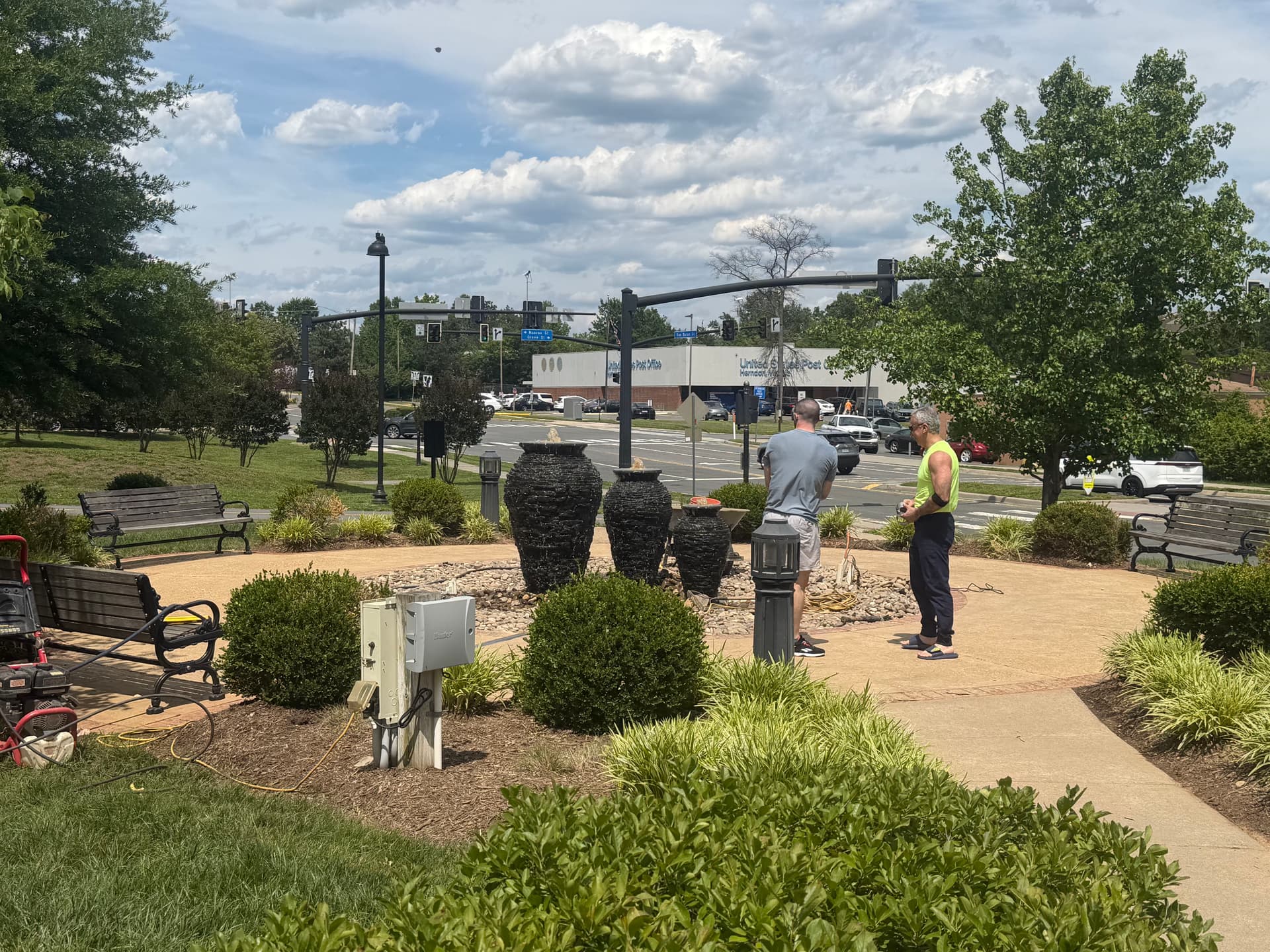 Triple Urn Fountain Installation Putting the Finishing Touches On