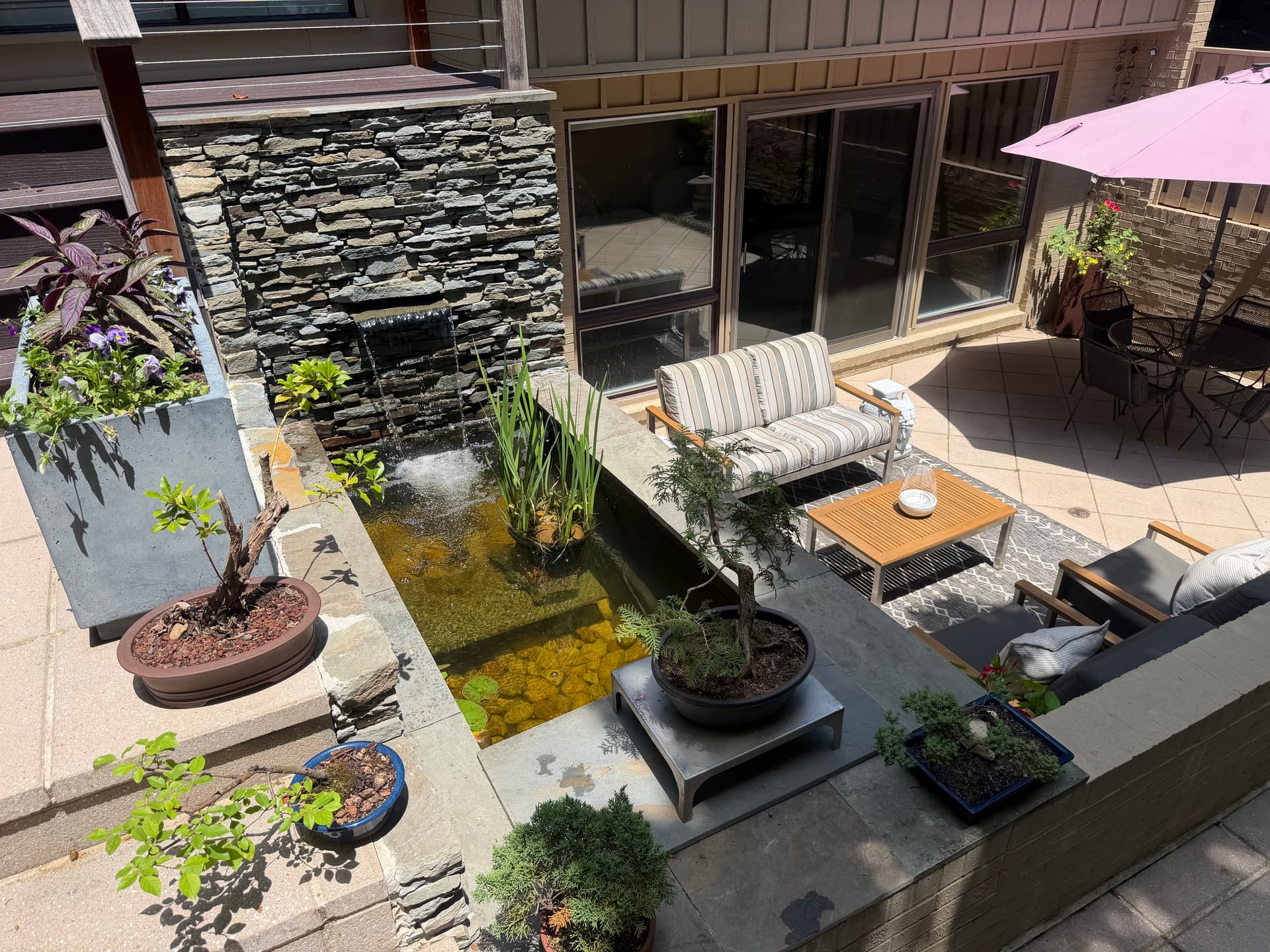 Koi Pond with Waterfall Wall Built for Alexandria Patio image